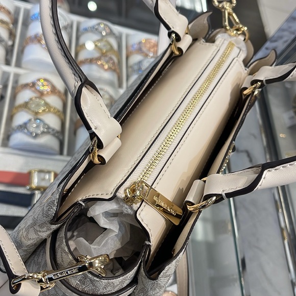 Michael Kors Reed Small Belted Logo Satchel Crossbody Purse 
Light Cream Mlt
NWT - Picture 6 of 16